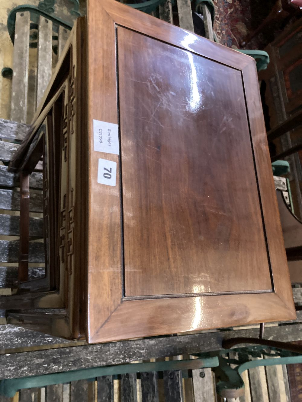 A nest of three Chinese hardwood occasional tables, largest 45 x 31cm height 59cm